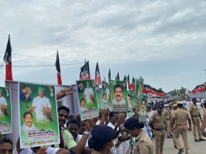 AIADMK workers with EPS posters