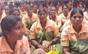 Sanitation worker Chennamma (centre) at the indefinite strike in Bengaluru. (South First/Saurav Kumar)
