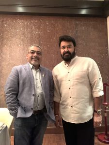Anirban Bhattacharyya with Mohanlal at the Chelembra bank robbery book launch