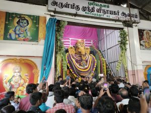 Lord Ganesh idol at Puliyakulam Ganesha temple decorated with sandalwood and four tonnes of flowers.