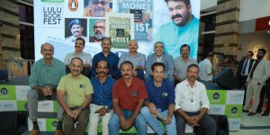 P Vijayan, CH Nagaraju, Anirban Bhattacharyya at the Chelembra bank robbery book launch