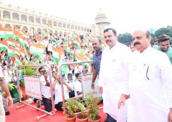 V Sunil Kumar with Chief Minister Basavaraj Bommai on 76th Independence Day celebrations at Vidhana Soudha (Supplied)