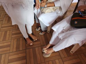 Bharat Jodo Yatra participants resting their injured feet during their afternoon break. South First/Anusha Ravi Sood