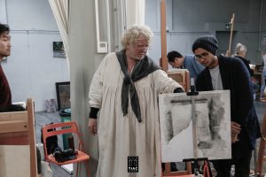 Receiving Feedback from Master Painter, Odd Nerdurm during a master workshop at TIAC Academy in Florence. (Supplied)