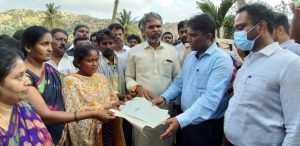 Authorities handing over site documents to Shobha