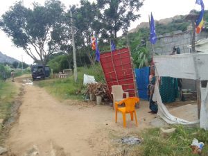 Police van stationed next to Shobha's house in Ullerahalli