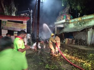 Firefighters at the scene of the Coimbatore blast.