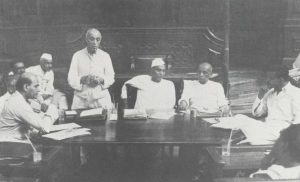 Jawaharlal Nehru addresses a meeting of a committee of the Constituent Assembly in 1949. Rajendra Prasad and Sardar Vallabhbhai Patel are among the others seen