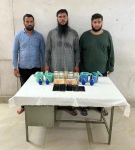 Mohammad Sameeuddin alias Abdul Sami (39), Abdul Zahed alias Motu (39), and Maaz Hassan Farooq alias Maaz (29), with the weapons, cash, and equipment seized from them. (Supplied)