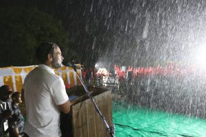 Rahul Gandhi addressing a Bharat Jodo Yatra gathering amid heavy downpour in Mysuru on Sunday. (Supplied)