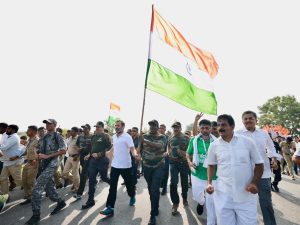 Rahul Gandhi walks with ex-armed forces personnel during Bharat Jodo Yatra in Raichur on Satuday. (Supplied)