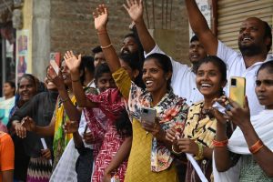 Crowds cheering as KTR campaigns in Munugode. (ysathishreddy/Twitter)